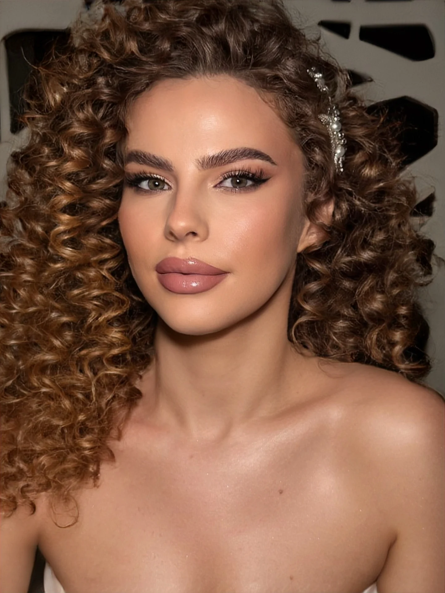 Defined curls and finished salon makeup
