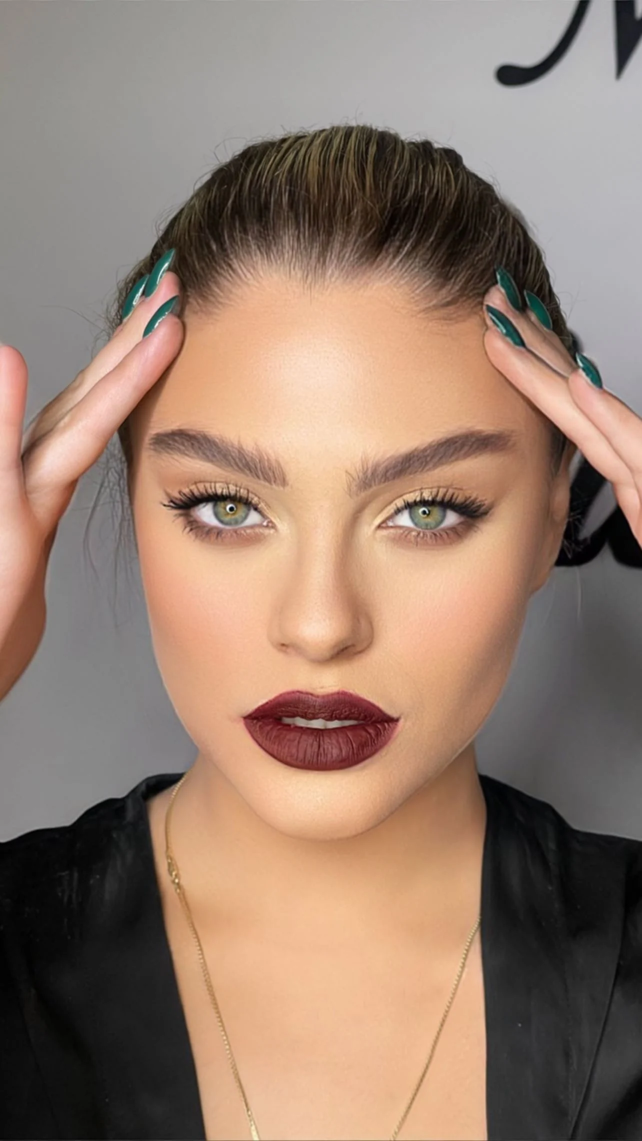 Statement makeup with a defined lip and lifted hair